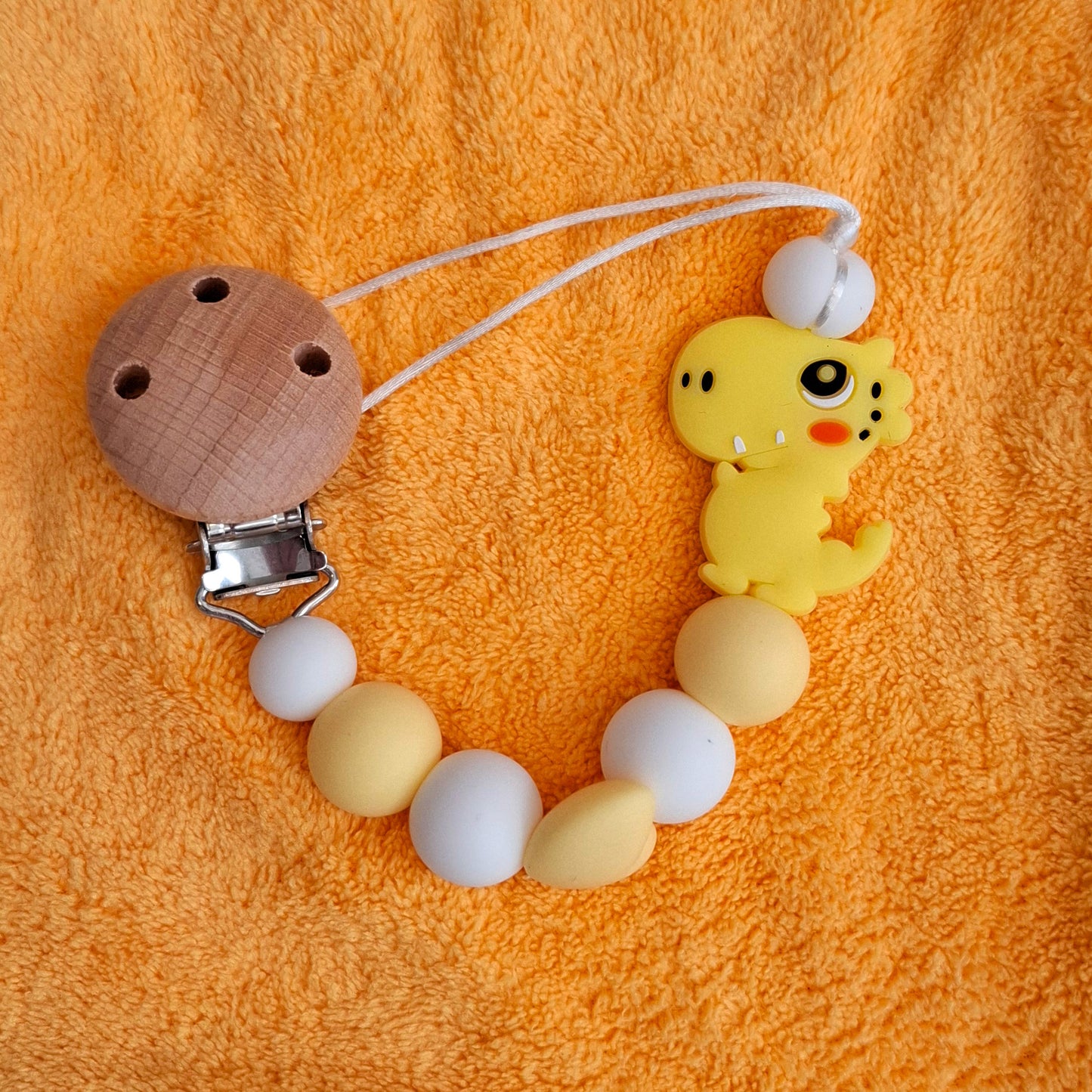 Grote speenknuffel Dino met speenkoord